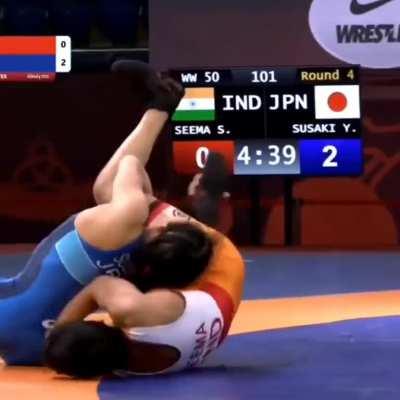 Undefeated Japanese wrestler who won the Olympics without a single point scored on her