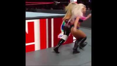 Alexa Bliss receiving multiple wedgies
