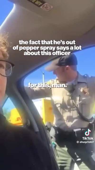 Police officer attempts to pepper spray civilian