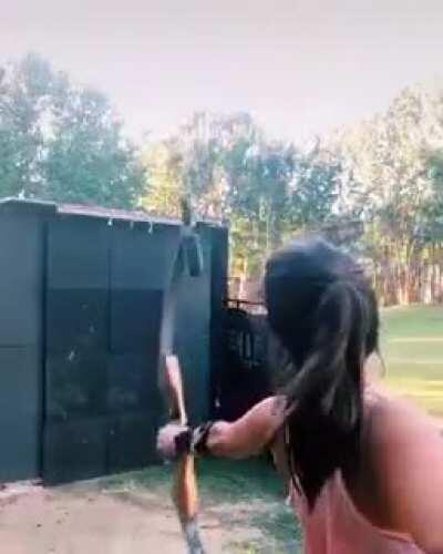 Archer Jennifer Delaney shoots a mint out of the air.