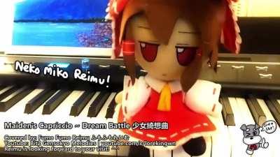 Fumo Reimu playing her own theme (on the piano) ᗜˬᗜ