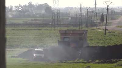 FSA fighters use a ZU-23-2 technical to suppress IS controlled positions while infantry maneuvers - Daraa Countryside - 2017