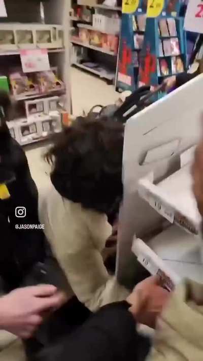 Scalpers ransacking a Costco display of Pokémon cards