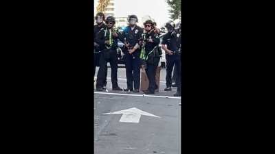 LAPD officer having the time of his life shooting at peaceful civilians exercising their 1st amendment right 2hr 12m before curfew & with zero violence or instigation