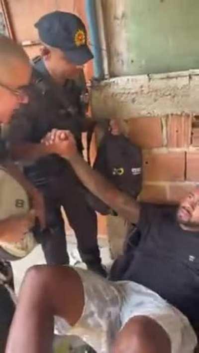 Gangster caught off-guard and disarmed.