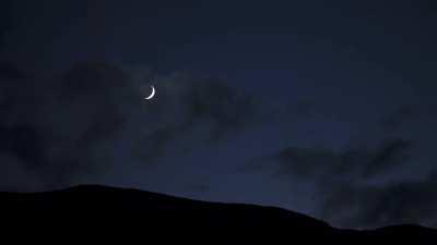 Moonset behind the mountain