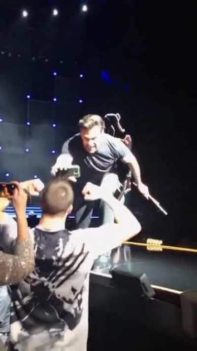 Hugh Jackman getting a fan fired up!