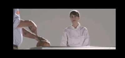 Bakers watch their loaves get turned into bread bowls.