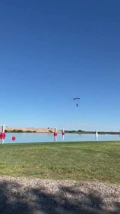 A skydiver trying to land safely.