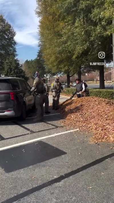 A group of ICE/CBP in American flag masks are going around and stopping people randomly in Charlotte, NC (11/16/25)