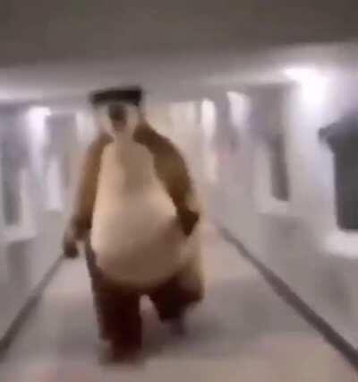 Me running to deposit the money bags after the guards spot the minigun in my back pocket