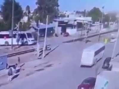 Bus is hit by train