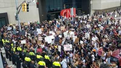 This was the scene last friday 5-29-20 in front of the CNN building minutes before violence erupted. They boxed them in and refused to let them to continue to peacefully march. This is what the news stations didnt show you and I have yet to see any other 