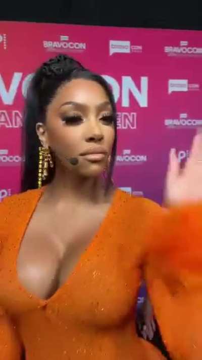 Orange looks good on her