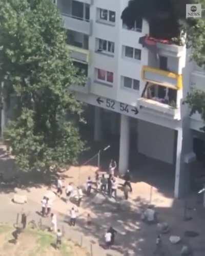 Two boys—ages 10 and 3–jumped 30 feet from a burning building in Grenoble, France. Two of the six adults who caught them broke their arms. Amazing heroism all around.