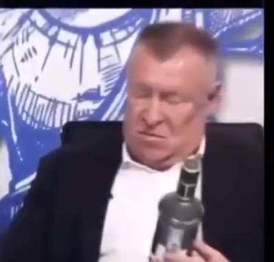 His face says all about all the bottles of vodka he already drank today in the morning
