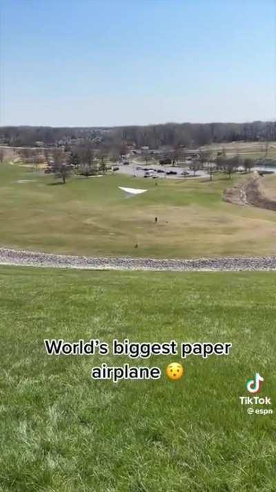 Flying a paper airplane but bigger