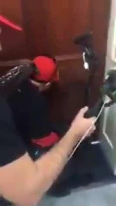 Video from 2019 of current sitting congresswoman Marjorie Taylor Greene harassing AOC's office through a mail slot and telling the office to open the door and come out.