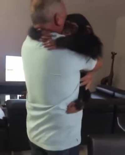 Rescued Chimp reunites with old caretaker.