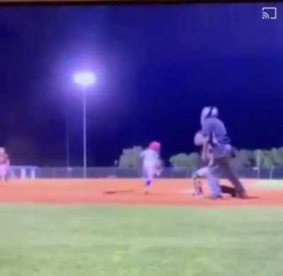 Kid hits pitch and foul ball from another field at the same time
