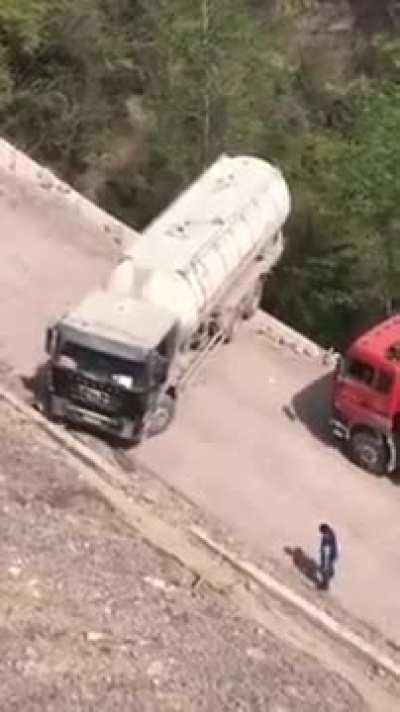 Trying to reverse the truck near the cliff