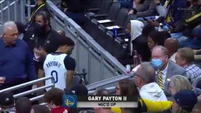 NBA player Gary Payton II knocks over a fans drink and gets them another one