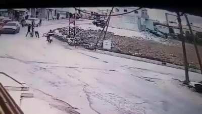 Guy popping a wheelie slams into girl. Girl survives, he gets the crap beaten out of him