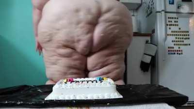 Jackie crushing a cake