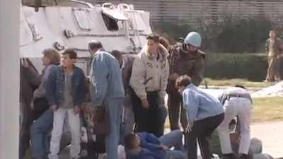 Serbian soldiers open fire at civilians who were trying to flee from the area. Siege of Sarajevo. Date Unknown.