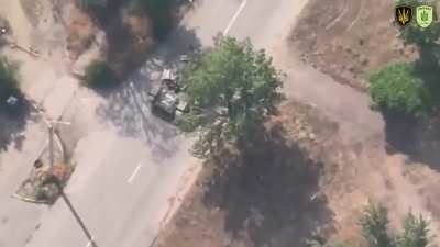 russian tank hits several light poles while running away