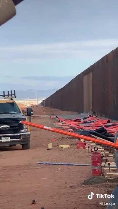 Randomly filming some workmen and a dude scales the wall, yeaaaah, not having it...