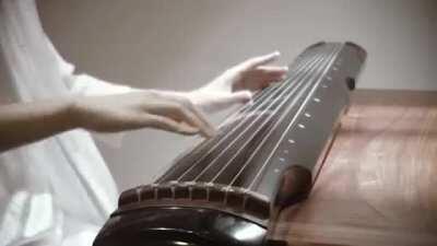 The Amazing Sound of The Gugin, a Chinese Instrument with Seven Strings.