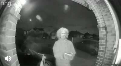 Woman standing outside a door with a knife 🔪