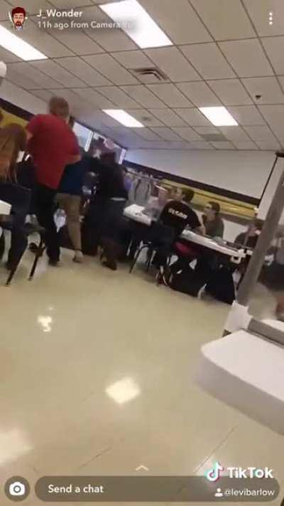 Dude in black stole blue shirt's face mask