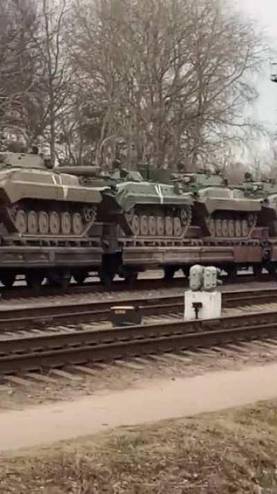 Russian tanks and vehicles are heading to Ukraine via railways. The video was taken in southwestern Belarus.