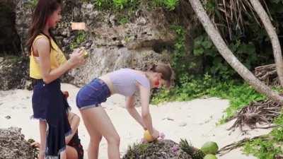 Jeongyeon opening a coconut