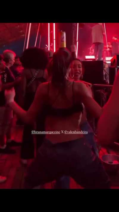 Twerking with a can on her head