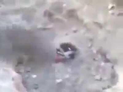 Syrian Arab army soldiers bury a civilian alive while they call Assad a god. NSFW!