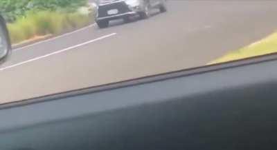 Police chase leads to car being pit maneuvered down a hill.