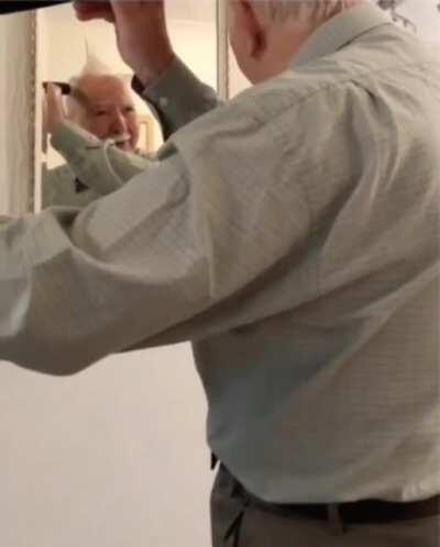 A grandpa discovered he could use a vacuum to do his hair