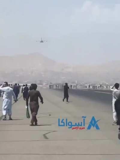 A clear video of men falling from C-17. They were Clinging to some parts of the plane that took off from Kabul airport today.
