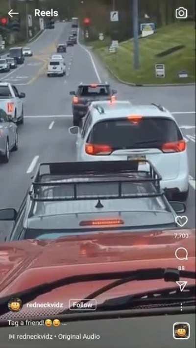 Idiot in truck making sure the world knows he's insecure.