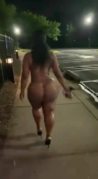 Bare naked except stilettos showing off that big black ass