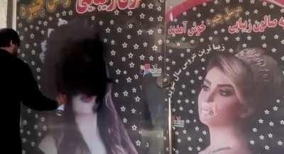 With the arrival of the Taliban, merchants began to erase the faces of women from their windows.