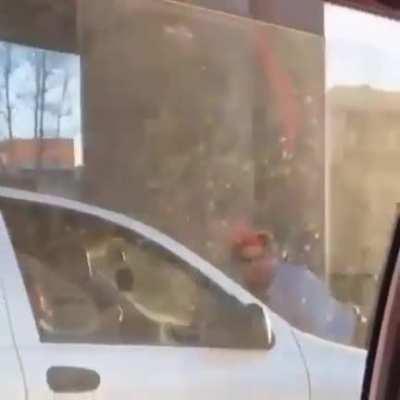 Happened in Tehran. He says She damaged his car and is trying to escape.