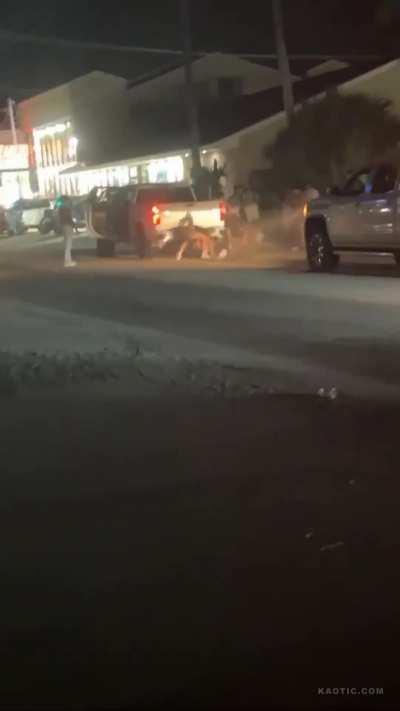 Man Gets Slammed and Stuck on Pickup Truck Hitch During Fight, Truck Takes Off