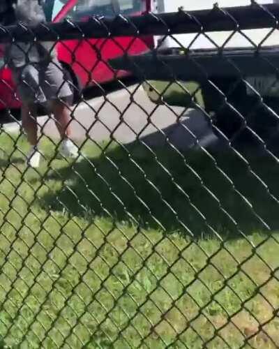 Racist counter protestor calls peaceful protestor a “n***er-lover” after hitting him with his flag