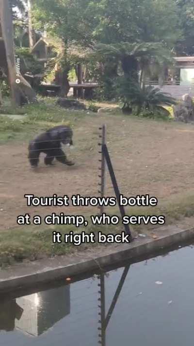 Throwing a water bottle at a champ