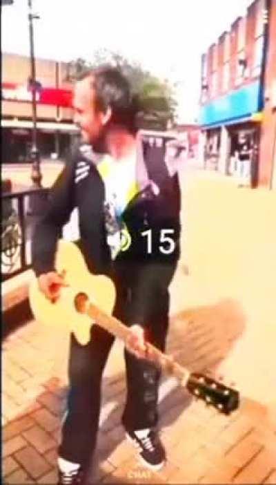 guy breaks guitar on crackhead