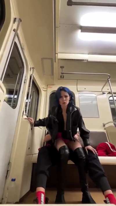 Reverse cowgirl on a train